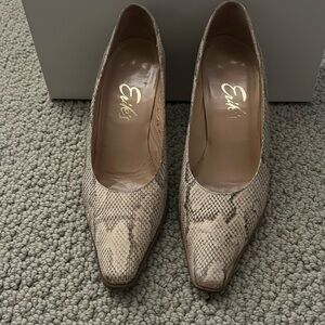 Previously worn all leather pumps